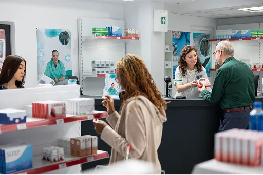 Health and wellness studio reception desk with a POS terminal